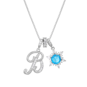 Detail of silver box chain necklace with micro-pave letter B and blue snowflake pendant