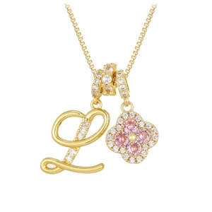 Gold necklace with diamond-encrusted letter L and pink gemstone clover pendant