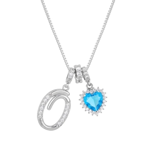 Detail of silver box chain necklace with blue heart gemstone and diamond-set O pendant
