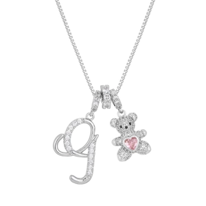Detail of silver box chain with crystal bear pendant and pink heart stone