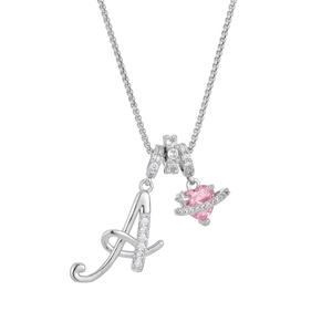 Detailed view of silver letter A pendant with pink heart planet and micro-paved zircons