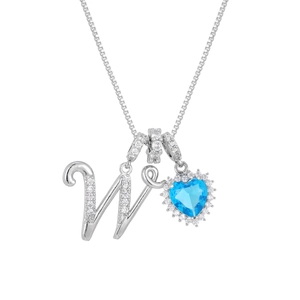 Detail of silver box chain with letter W pendant and blue heart-shaped gemstone