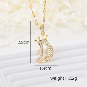 Macro shot of 18k gold plated crown letter D pendant with cubic zirconia and dimensions
