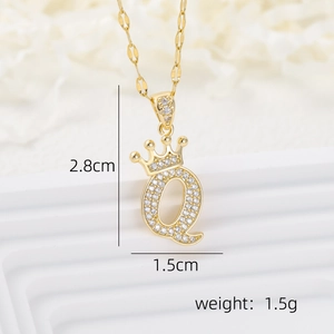 Detailed view of crown letter Q pendant with dimensions 2.8cm by 1.5cm in gold finish