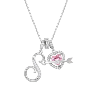 Detail of silver heart necklace with pink zircon, arrow design and letter S pendant