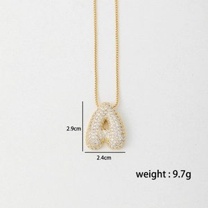 Puffy bubble letter A necklace in gold with micro-paved zircons and box chain