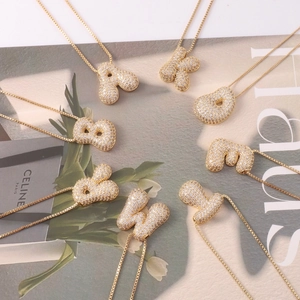 Golden chubby initial necklaces with cubic zirconia pavé stones and fine square chains