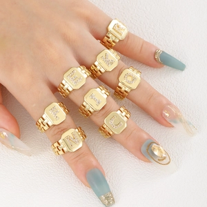 Gold strap-style adjustable rings with micro-set rhinestone letters for women