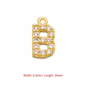 Detail of gold letter B pendant with cubic zirconia, size 5.3mm by 10mm wide