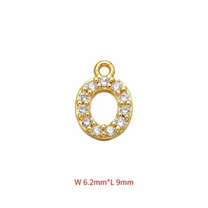 Detailed view of gold plated letter O pendant with cubic zirconia, size 6.2mm by 9mm