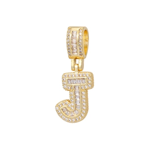 Detailed close-up of 18k gold plated letter J pendant with micro-paved cubic zirconia stones