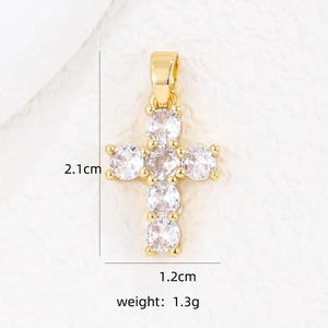 Detailansicht des goldene Kreuzanhänger mit Zirkonia, Maße 2,1cm x 1,2cm groß
