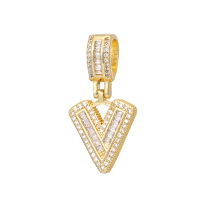 Detail of 18k gold plated letter V pendant with sparkling zircon crystals and baguette stones