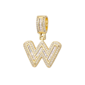 Detailed view of iced-out 18k gold plated letter W pendant with sparkling zircon stones