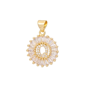 Detailed macro view of 18k gold plated letter Q pendant with cubic zirconia inlay