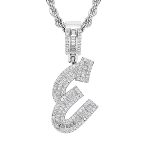 Detailed view of silver letter E pendant with pavé set cubic zirconia on a rope chain