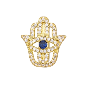 Detailed view of gold-plated Hamsa Hand pendant with sparkling white zircons and blue evil eye