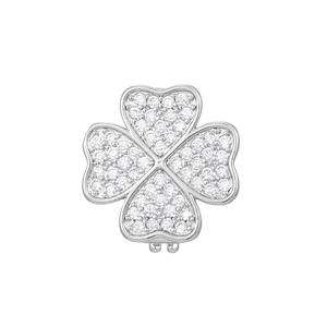 Macro detail of silver four-leaf clover charm with heart petals and paved cubic zirconia