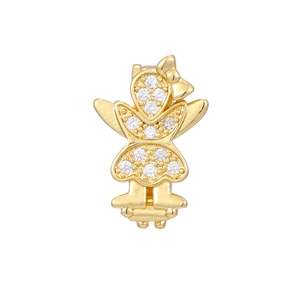 Close-up of a gold-plated girl charm with bow and sparkling zircon stones for jewelry
