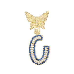 Detail of butterfly and letter C pendant with blue and white pavé-set zircons