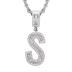 Close-up of hip hop S-letter pendant with pave-set cubic zirconia on a rope chain
