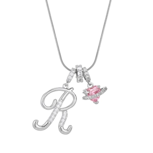 Silver alphabet R necklace with pink crystal heart planet pendant on white background