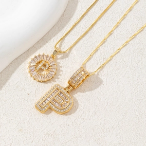 Gold letter P necklace set with sparkling baguette zircon crystals and box chain