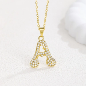 Gold plated letter A heart pendant necklace with micro-paved cubic zirconia crystals