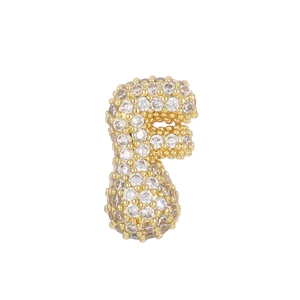 Close-up of a 18k gold plated lowercase f bubble pendant with micro paved zircon stones