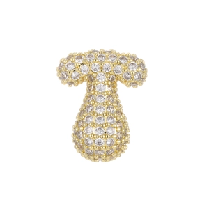 Macro view of 18k gold letter T bubble pendant with sparkling zircon micro-pave setting
