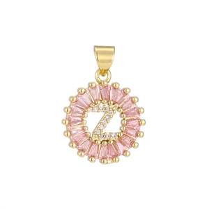 Macro shot of letter Z pendant with pink baguette stones and micro-paved white zircons