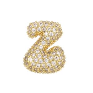 Close-up of golden bubble letter Z pendant with micro-pave cubic zirconia crystals