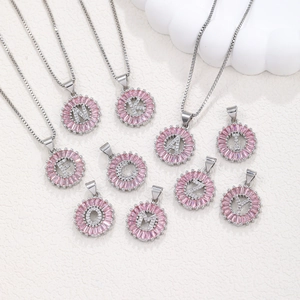 Pink baguette zircon initial necklace with silver plating and micro-pave letter pendant