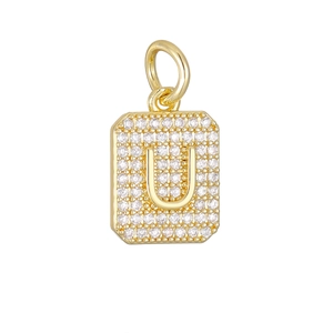 Detailopname van 18K gouden hanger letter U met witte zirkonia in micro-pave zetting