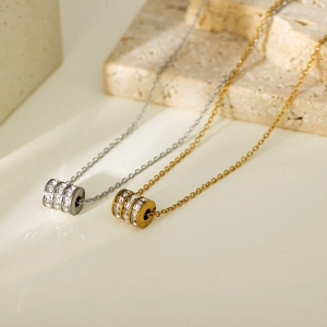 Exquisite gold and silver titanium steel necklaces with sparkling paved zircon cylinders