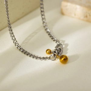 Two-tone titanium steel necklace with silver Cuban chain and golden barbell pendant