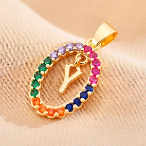 Macro view of oval letter Y pendant with rainbow cubic zirconia on stainless steel necklace