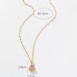 Elegant gold necklace with a pink teardrop pendant and sparkling micro-inlaid zircon stones