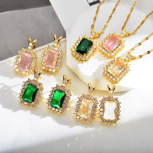 Detailed close-up of rectangle colored zircon jewelry set with necklace and earrings