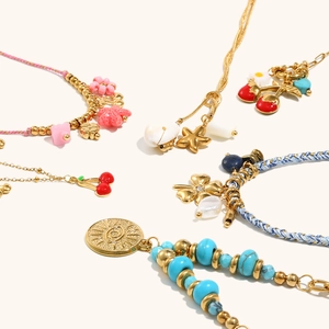 Bohemian gold plated bead bracelet set with cherry star and evil eye charms