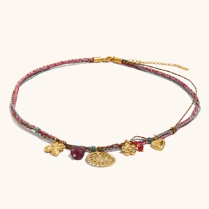 Bohemian braided necklace with sun and butterfly charms on gold-plated stainless steel chain