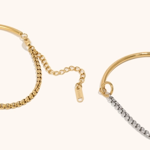 Detail of 18K gold-plated stainless steel chain with engraved S.steel droplet tag