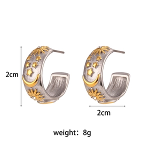 Detailed view of C-shaped earrings with sun moon star motifs and 2cm size labels