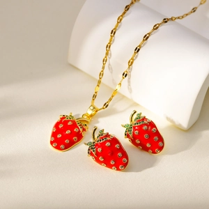 Mini red strawberry jewelry set with gold necklace and stud earrings in enamel finish