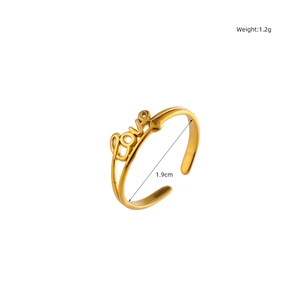 Detailed view of adjustable gold Love ring with heart accent and measurement markings