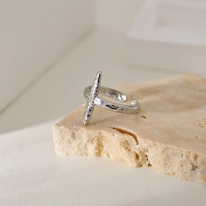 Irregular textured titanium steel open ring with vertical bar and hammered finish
