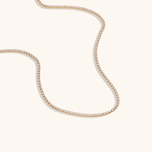Detail of 18K gold-plated stainless steel chain with 2mm round-cut cubic zirconia stones
