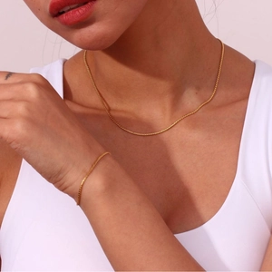 Minimalist gold plated stainless steel S-chain necklace and bracelet set for women