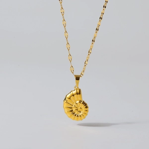 Detailed close-up of 18K gold stainless steel snail shell pendant with mirror finish