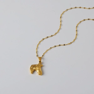 Polished 18K gold stainless steel necklace featuring a realistic horse head pendant